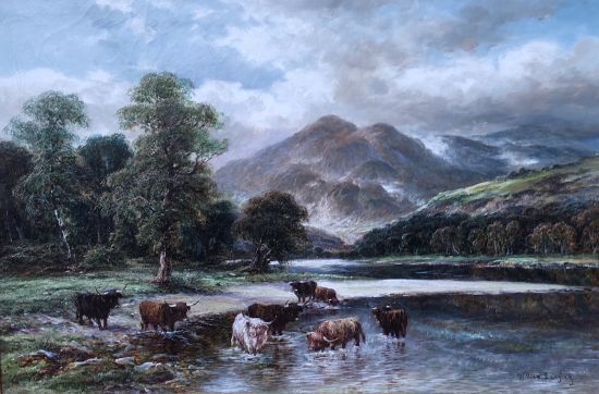 Highland cattle by a Scottish Loch