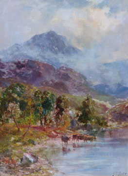 Cattle watering by a loch